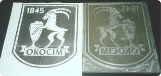 Znacznik z logo Browaru Okocim do wypalania na stołach drewnianych.